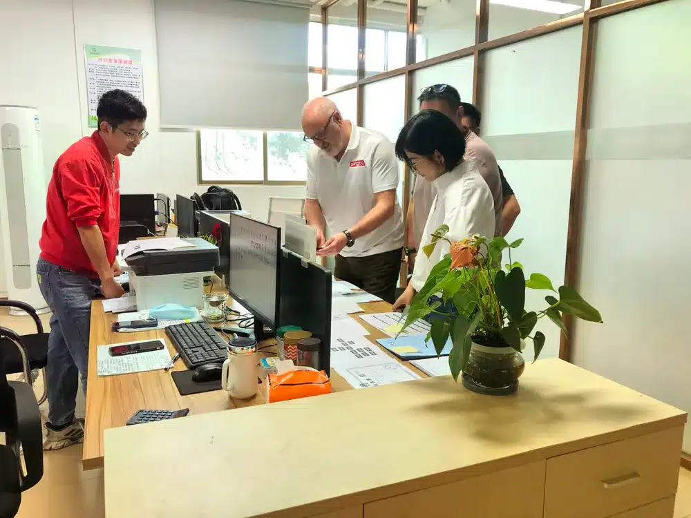 Haikuo team reviewing a customer drawing and profile requirement